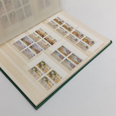 16 page stamp album with about 180 Rhodesia mint stamps