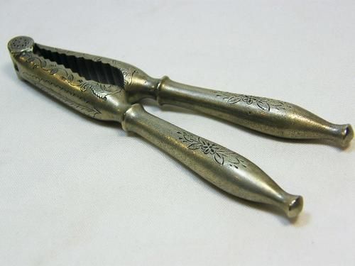 Antique engraved nutcracker - flower pattern