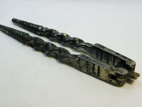Antique twisted arm nutcracker