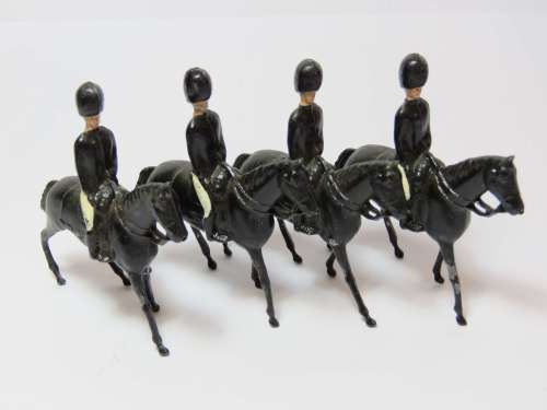 Lot of 4 British lead soldiers on horses
