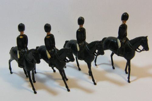 Lot of 4 vintage British lead soldiers on horses