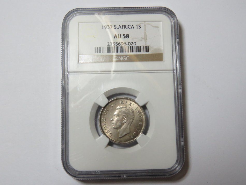 South Africa 1937 Shilling graded AU 58 by NGC