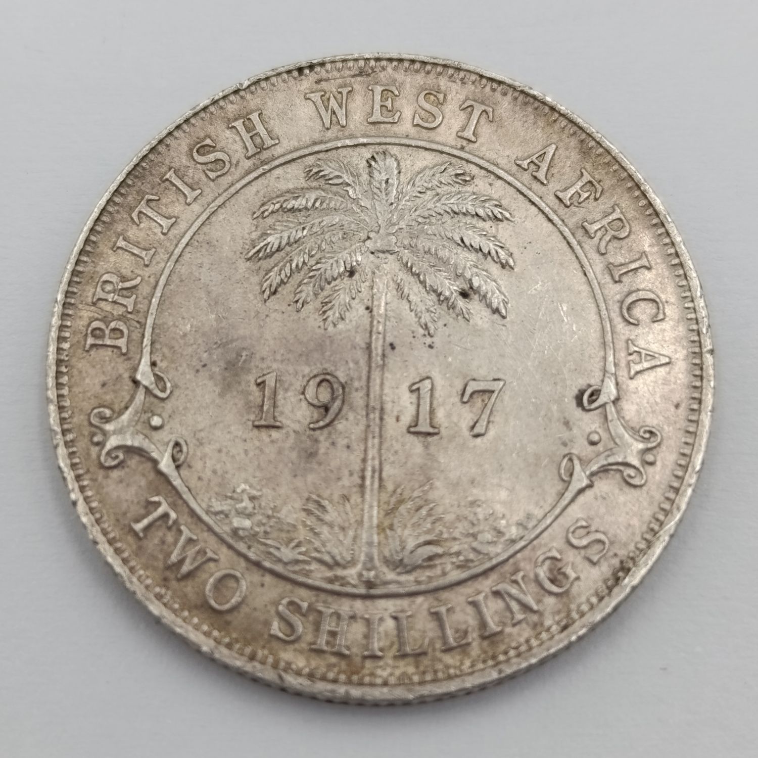 1917 British West Africa Two Shillings with H mintmark XF+