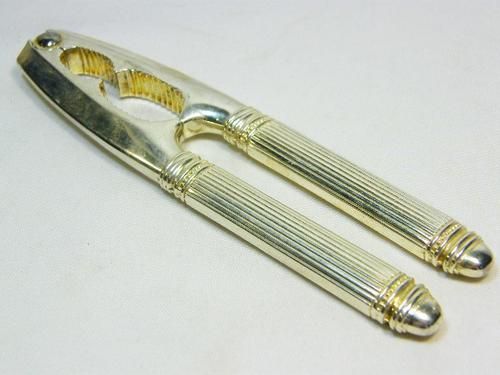 Vintage High Class silver plated nutcracker with double opening