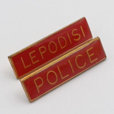 Pair of Bophuthutswana Police breast badges (one Tshana and one English)
