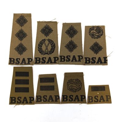 Set of 8 Rhodesia BSAP rank epaulette cutouts on board backing