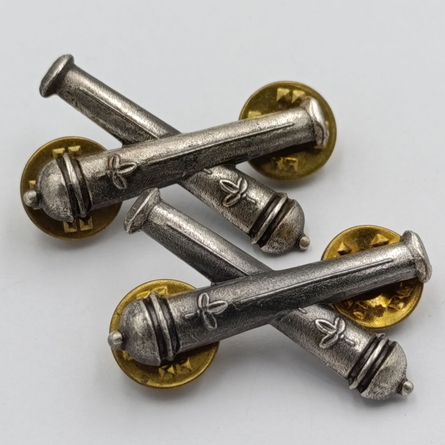 Pair of SWATF Artillery collar badges