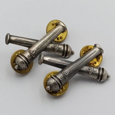 Pair of SWATF Artillery collar badges