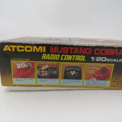 Vintage Checkers Ford Mustang Cobra Turbo radio control car-scale 1/20 in original box - Not tested