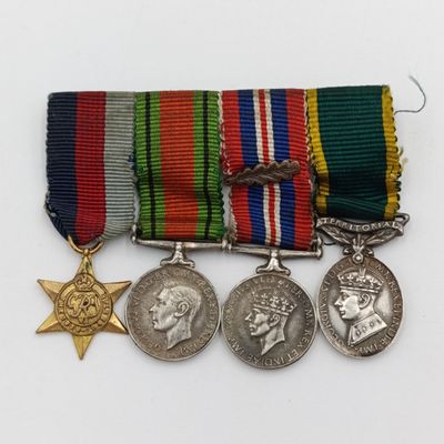 Set of 4 WW2 miniature medals with mentioned in despatched oak leaf - including efficient service medal