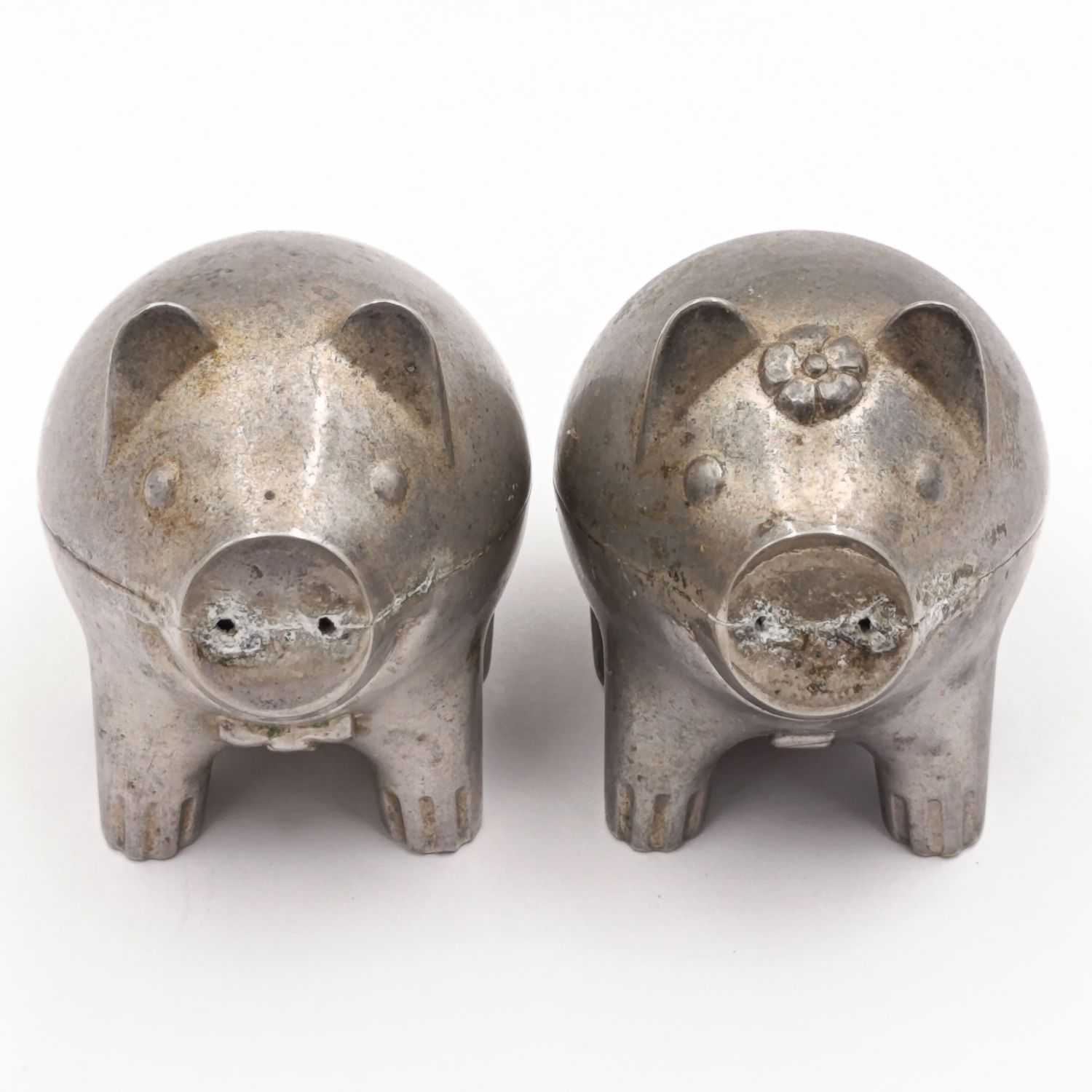 Pair of metal Piggy salt and pepper shakers