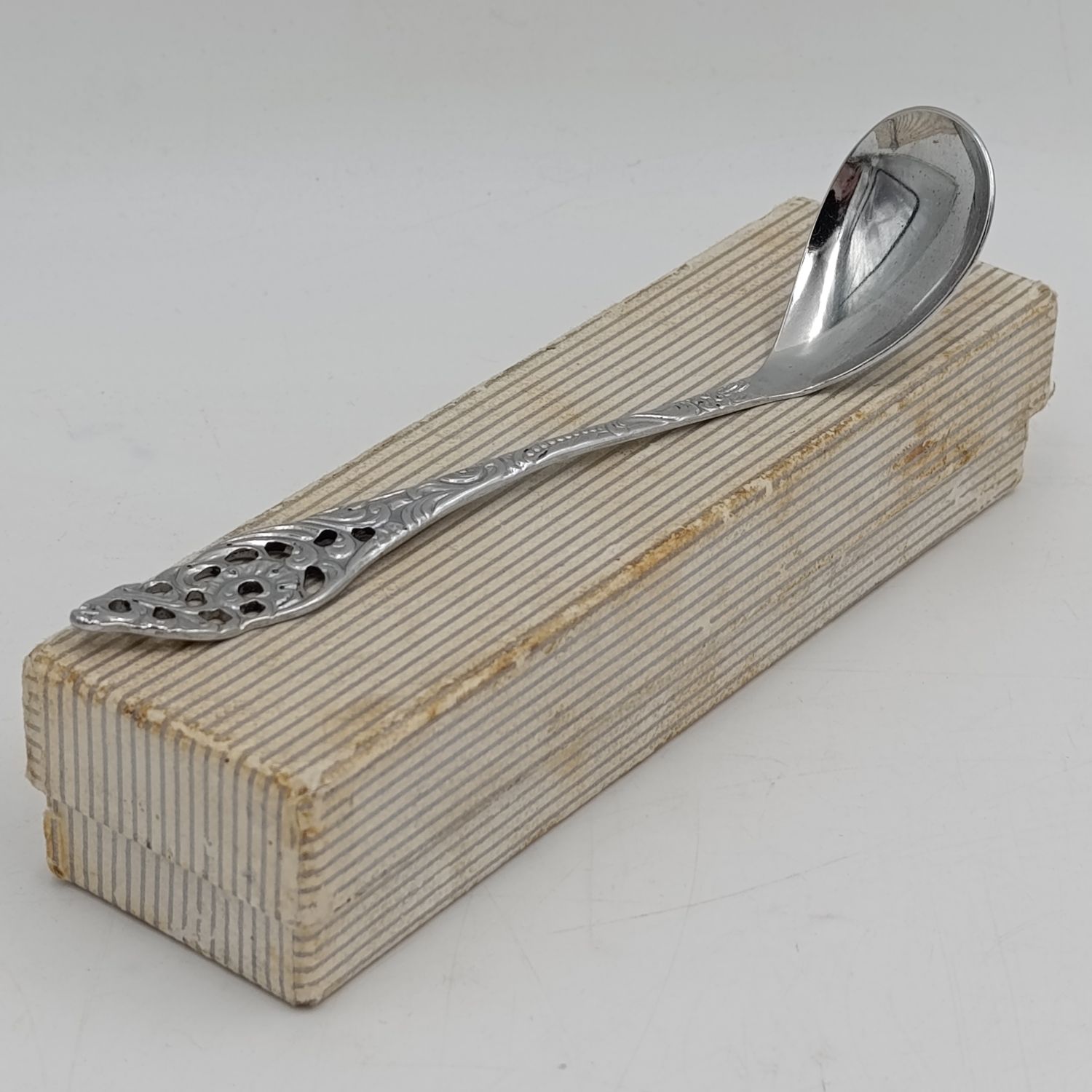 Vintage chrome plated sugar spoon