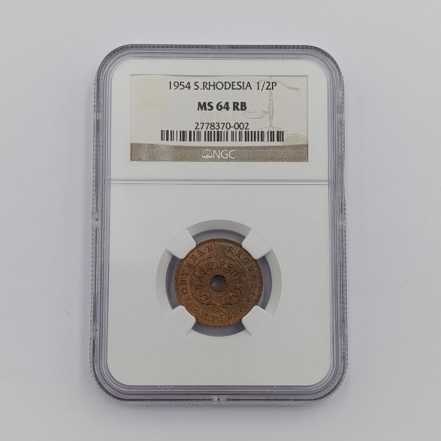 1954 Southern Rhodesia half penny graded MS64 RB by NGC