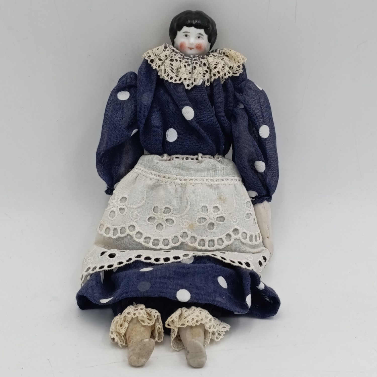 Antique rosy cheeks doll - late 1800's - 22cm long