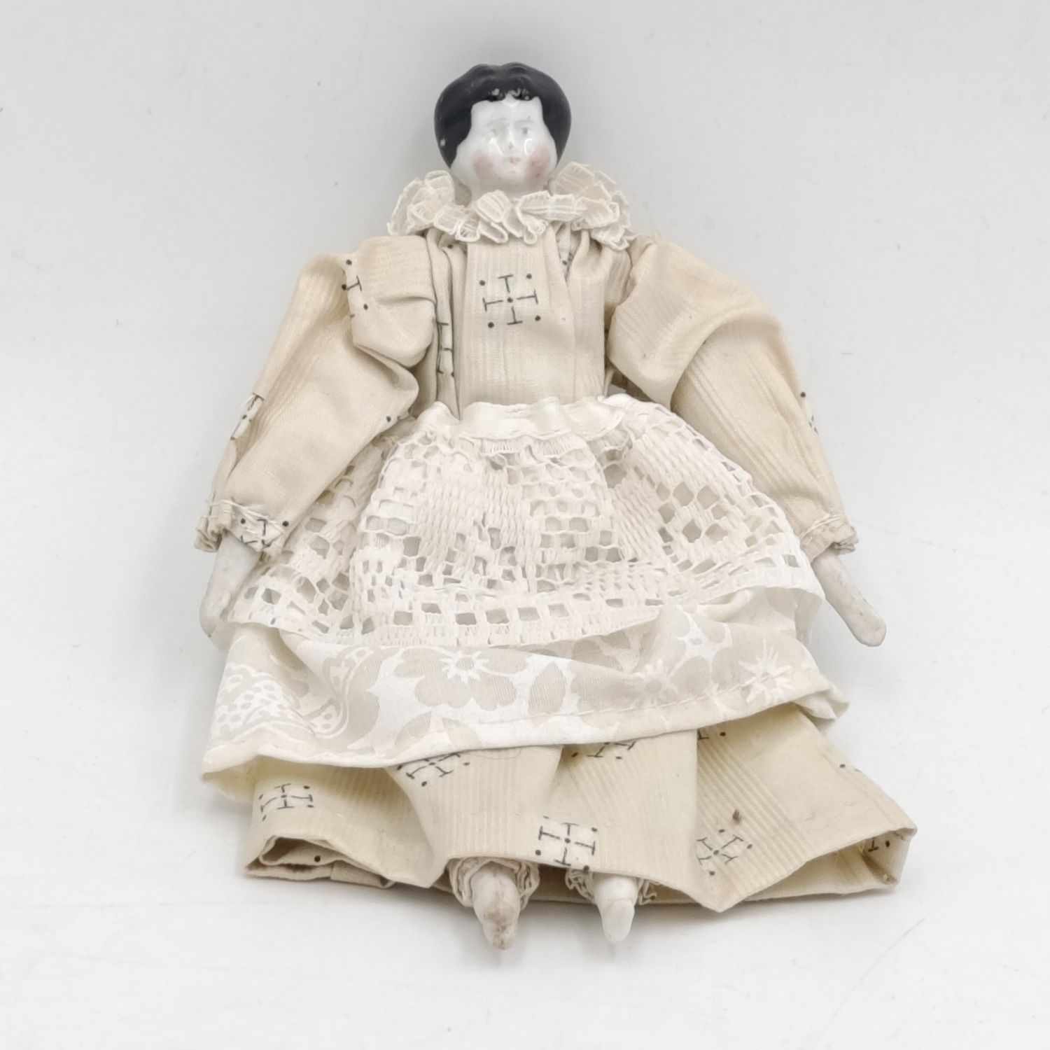 Dark hair rosy cheeks antique doll - 17cm long