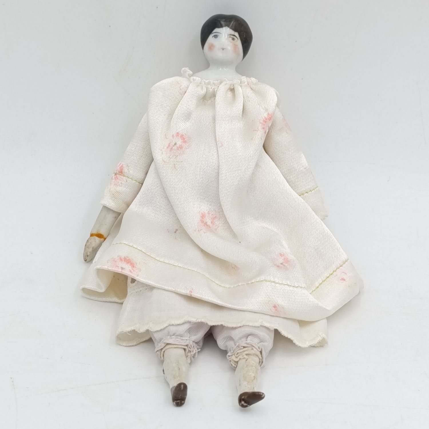 Dark hair rosy cheeks blue eyes antique doll - 19cm long - repaired hands
