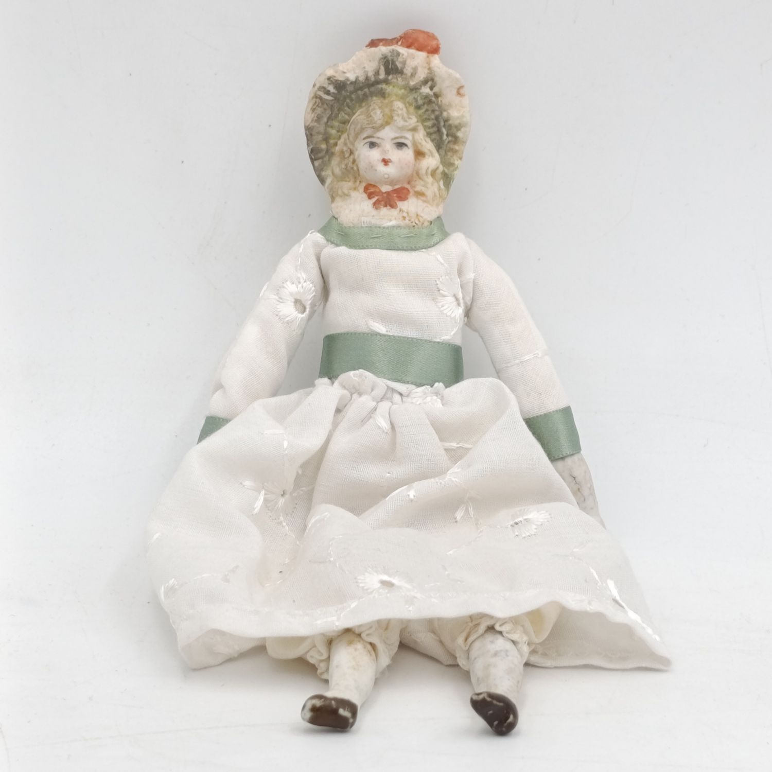 Antique Bisque doll 20cm long - hat chipped - late 1800&#39;s