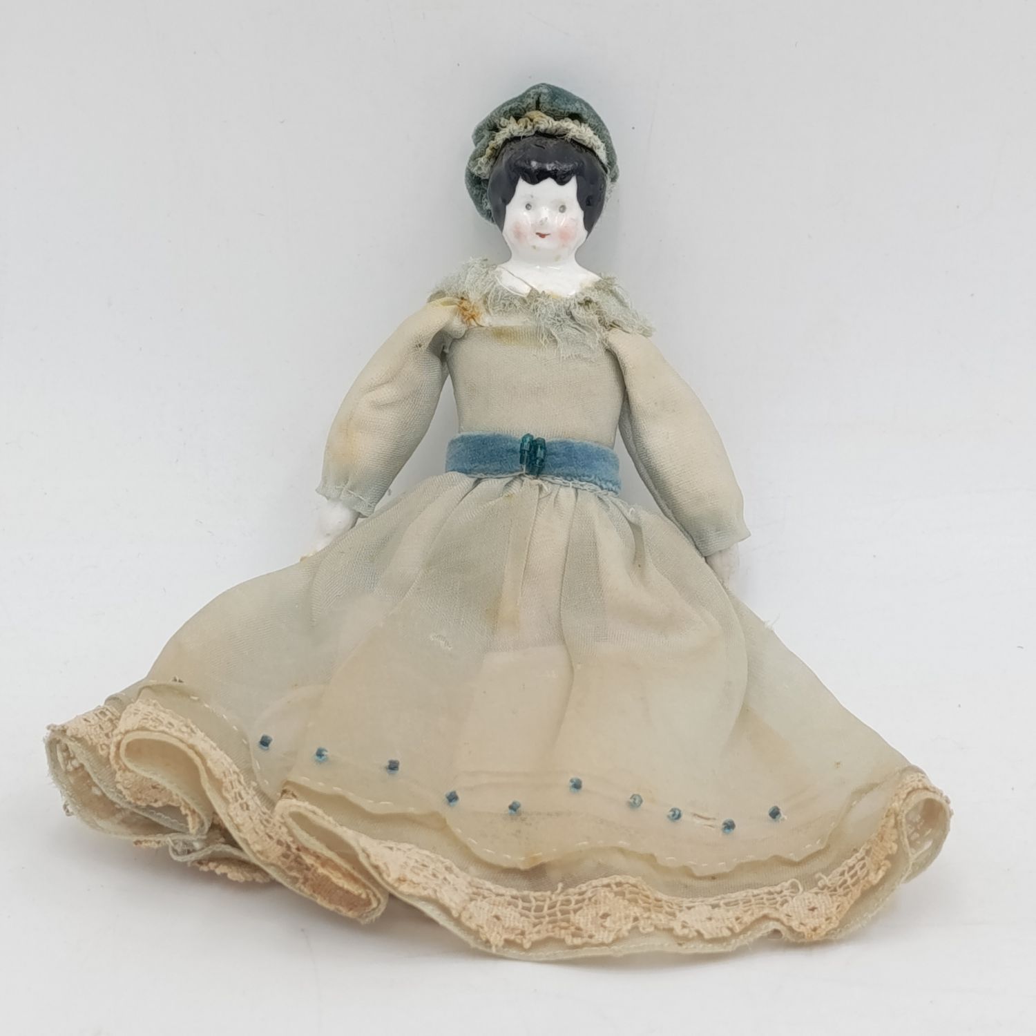 Antique Brown hair rosy cheeks German doll with hat - late 1800&#39;s - 18cm long