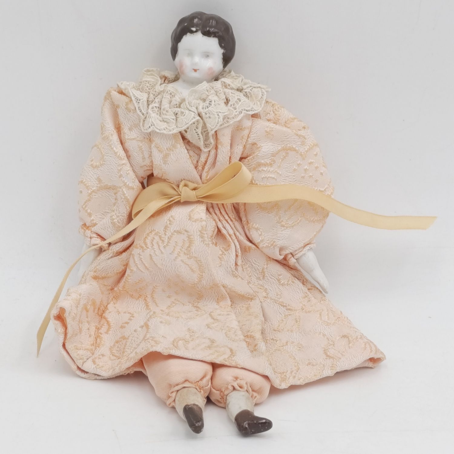 Antique brown hair rosy cheeks doll - 21cm long - late 1800&#39;s