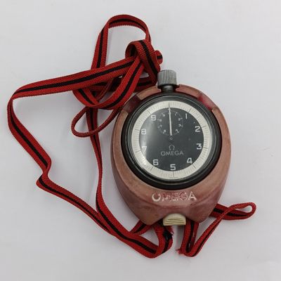 Vintage Omega 10 minute mechanical stopwatch in omega casing - working