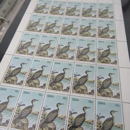 Loose leaf album with South West Africa full sheets of stamps at portion of book value - rarely seen