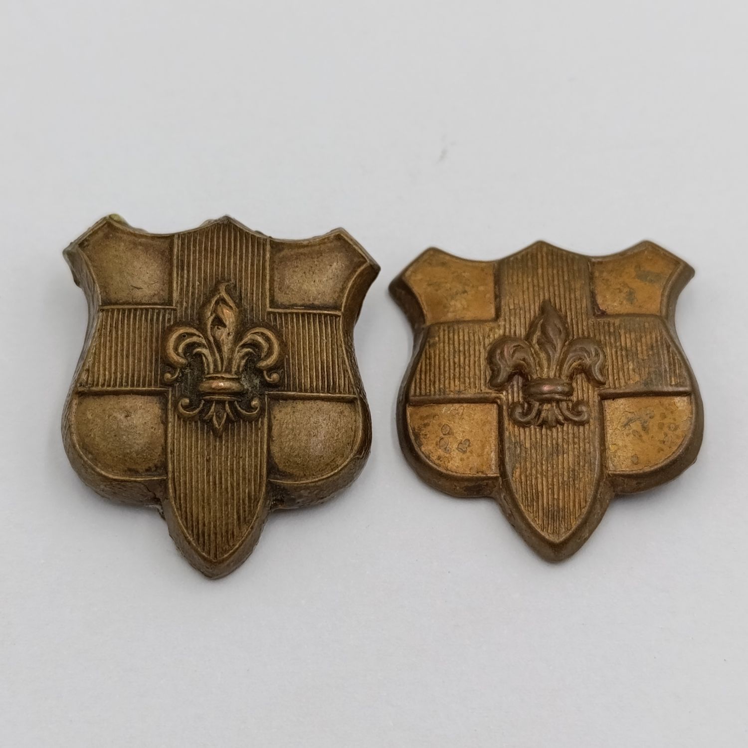 Pair of The Royal North Lancashire regiment collar badges