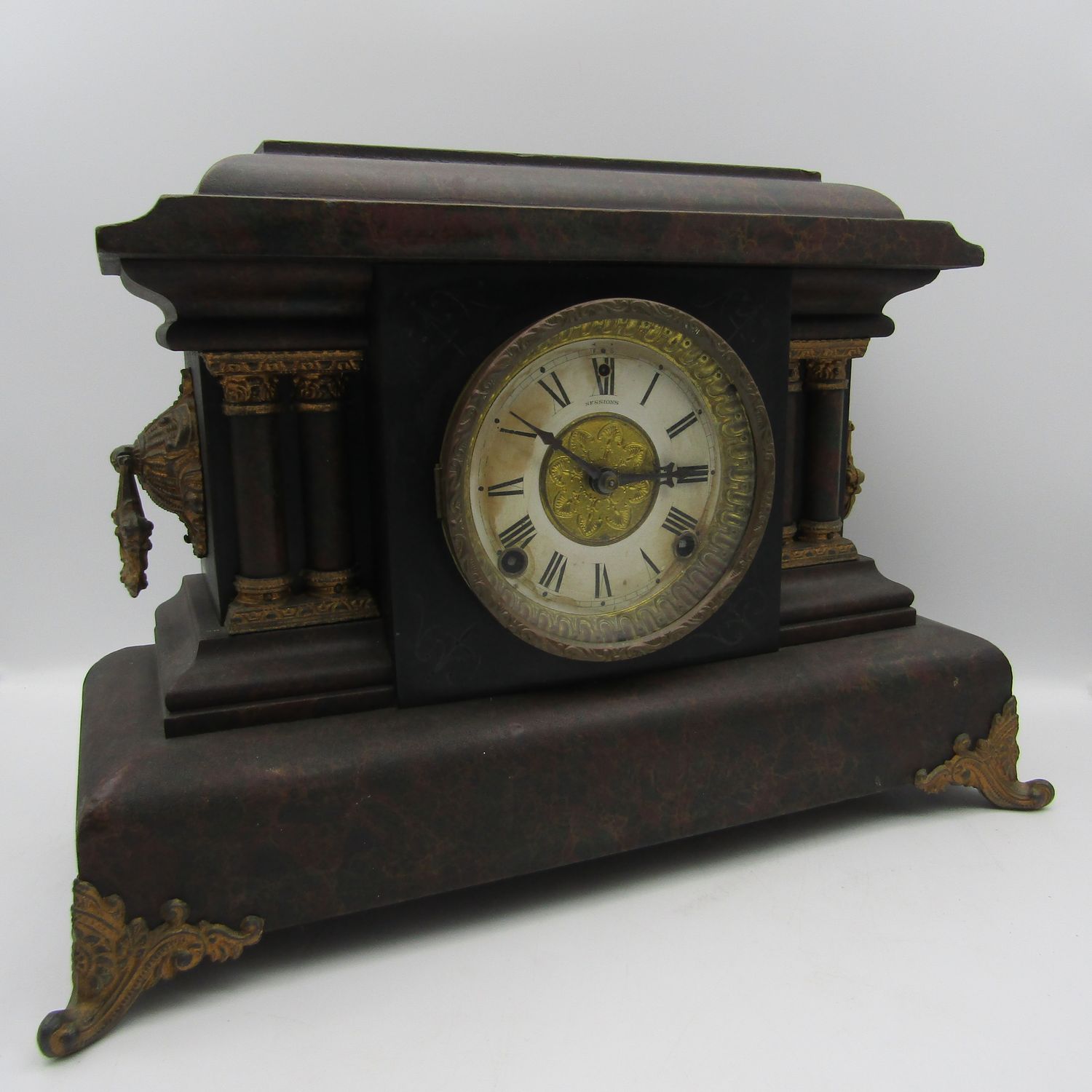 Antique Sessions mantel clock with E.N. Welch label on back