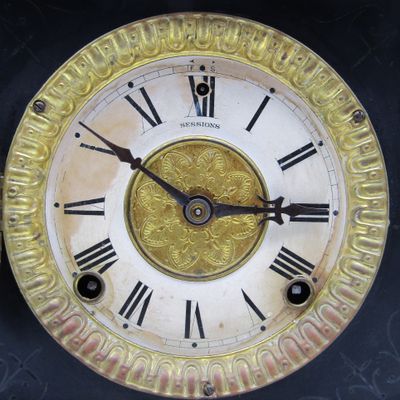 Antique Sessions mantel clock with E.N. Welch label on back