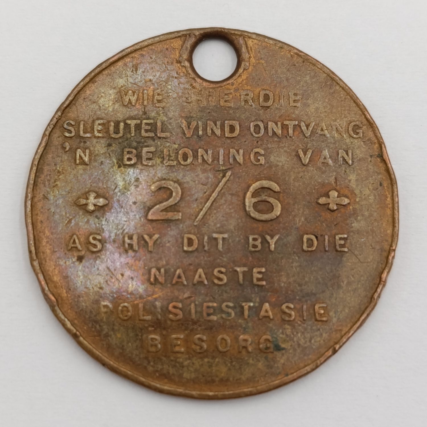 Old Reward token for lost keys - whoever finds this key will be entitled to 2/6 on taking it to the nearest Police station