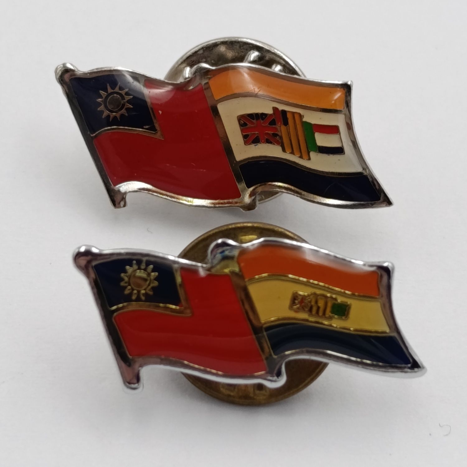 Lot of 2 vintage South Africa and Taiwan pin badges