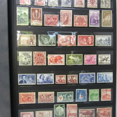 Slip Album with over 1400 stamps from Australia, Cook Islands, New Zealand and more
