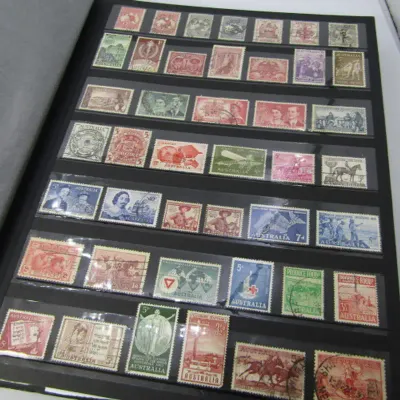 Slip Album with over 1400 stamps from Australia, Cook Islands, New Zealand and more