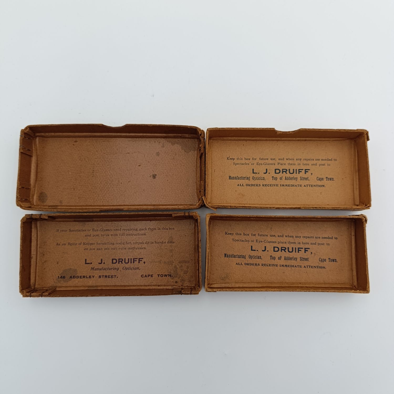 Pair of LJ Druiff Cape Town optician delivery boxes - vintage