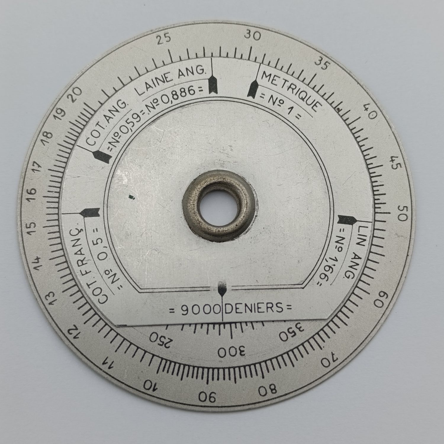 Vintage slide rule disk calculator