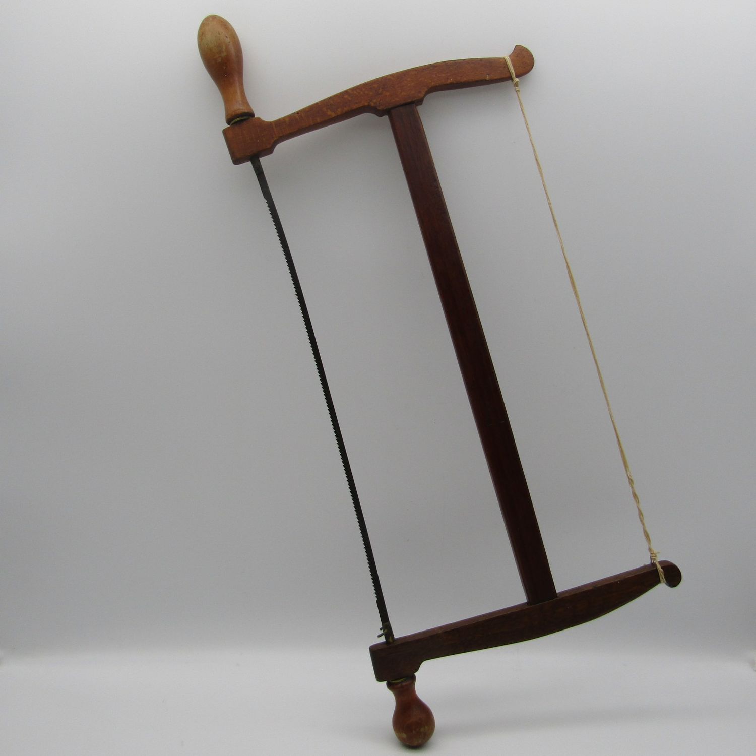 Antique wooden bow saw