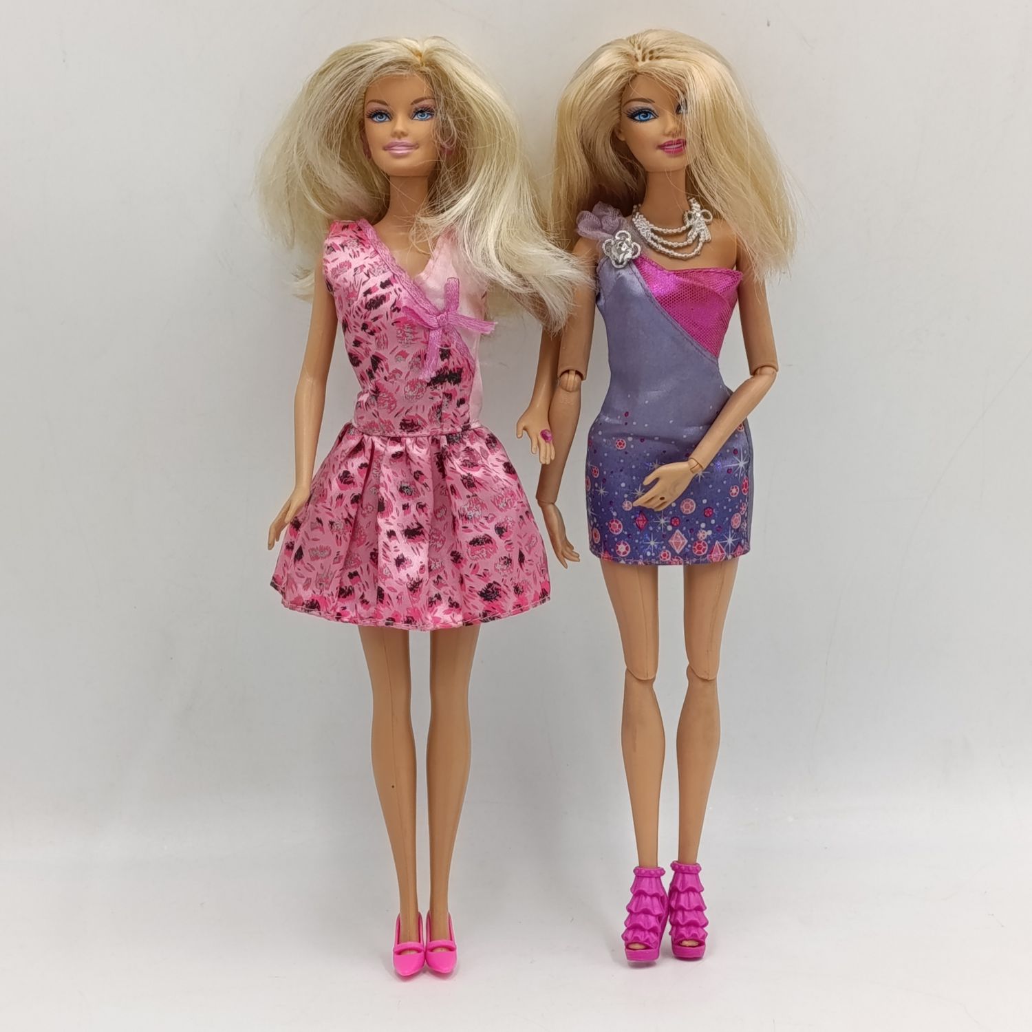 Two dolls fully clothed