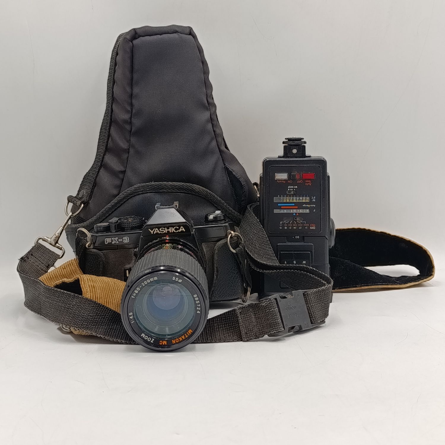 Vintage Yashica FX-3 35mm camera with Hanimex T21 flash in bag - shutter working