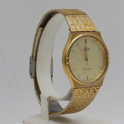 Orient Quartz Gold colour men&#39;s watch - working