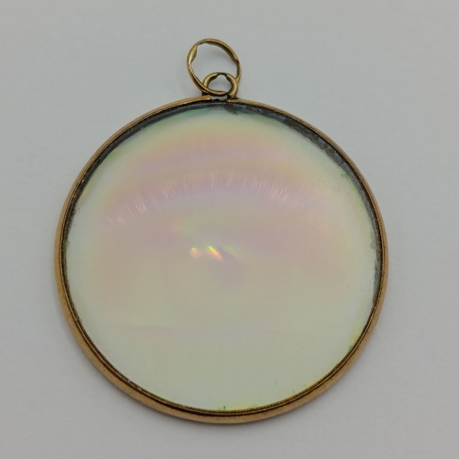 Vintage Hologram eye pendant with 9kt Gold surround
