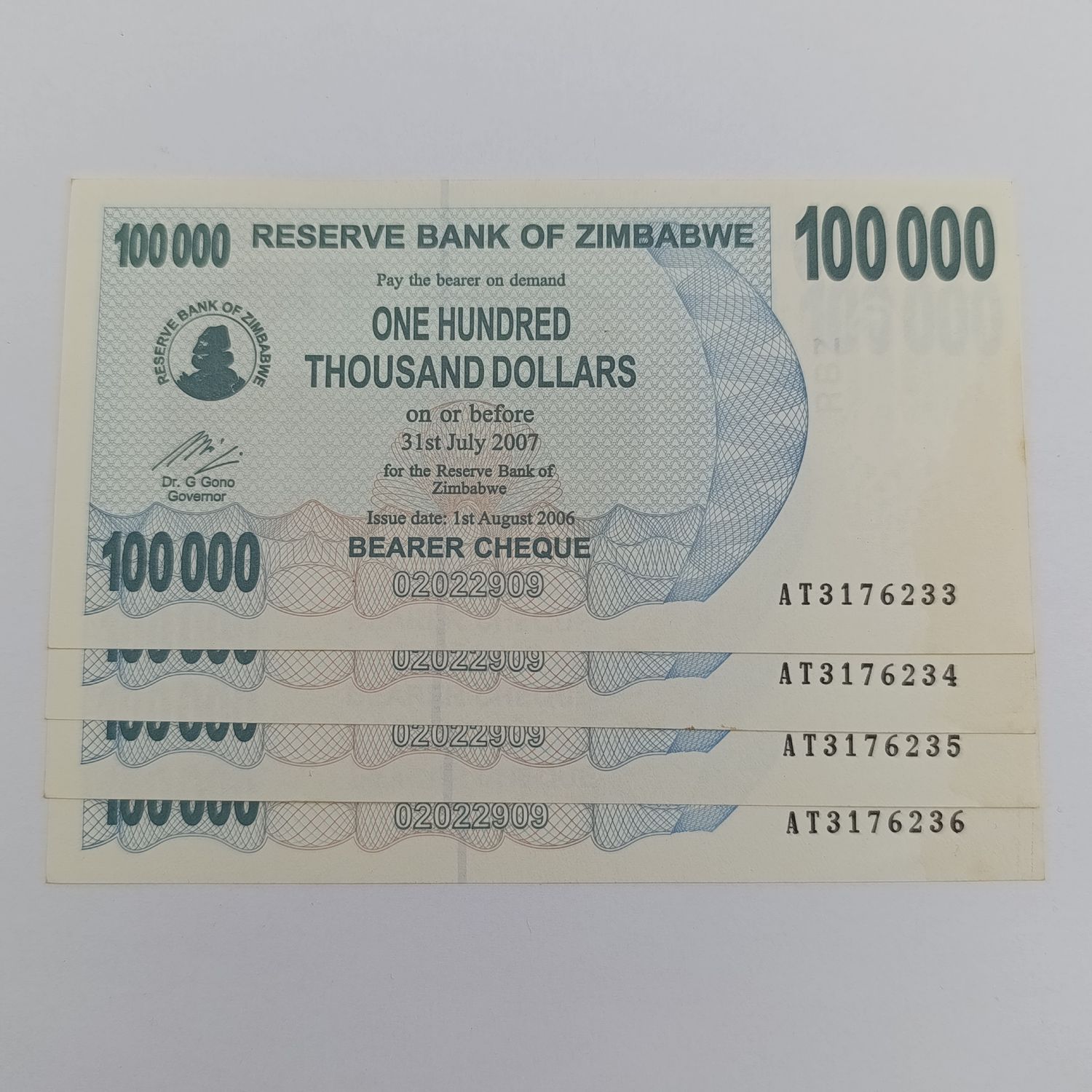 Zimbabwe 2006 Bearer cheques 100 000 dollars - 4 uncirculated notes with consecutive numbers