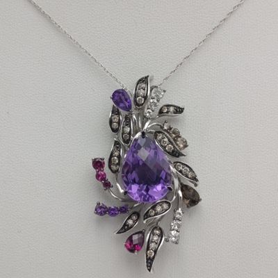 14kt white gold Amethyst necklace and pendant set with earrings - including diamonds, and quartz - weighs 19.4g