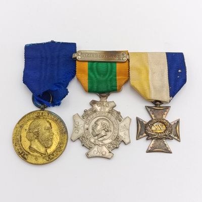 Set of 3 Dutch Aceh War medals that belonged to a soldier who served in the Aceh War - including 15 Years service medal