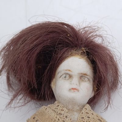 Antique bisque doll with long hair - 15cm long