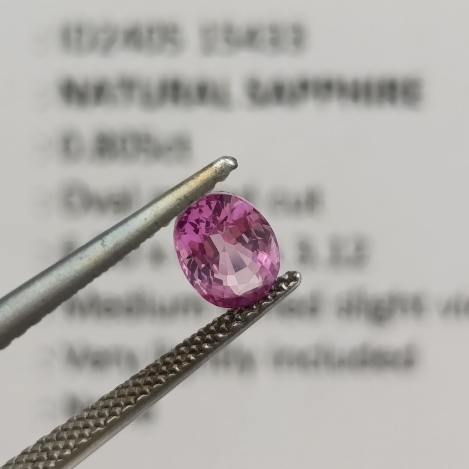 Natural slight violet pink sapphire oval mixed cut 0.81 carat with Gemlab certificate