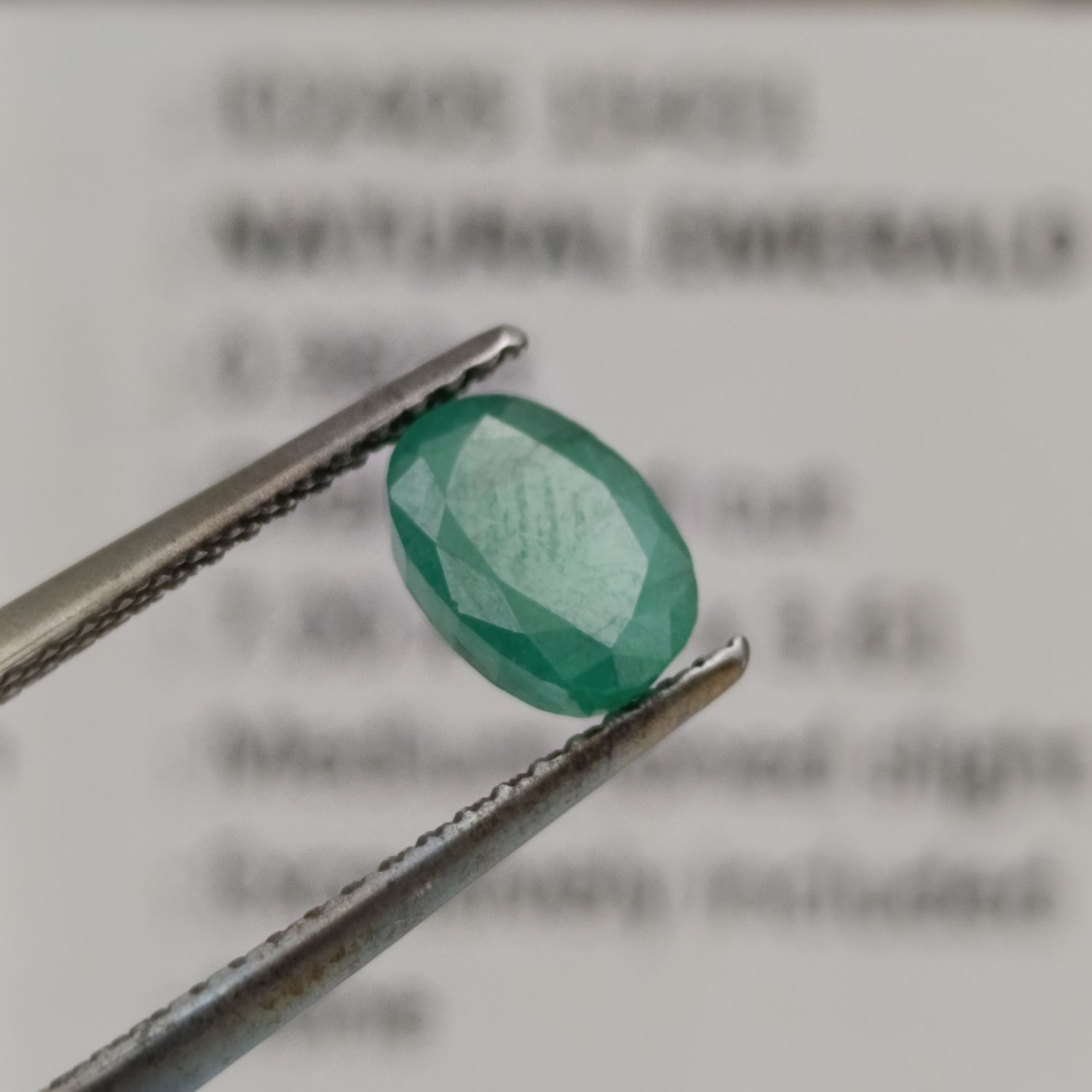 Natural Emerald of 0.98 carat oval mixed cut slight yellowish green with Gemlab certificate