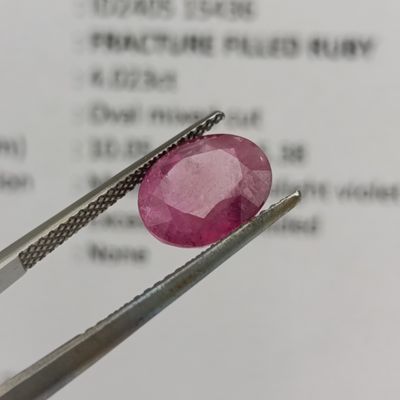 Fracture filled Ruby slight violet red Oval mixed cut 4.02 carat with Gemlab certificate