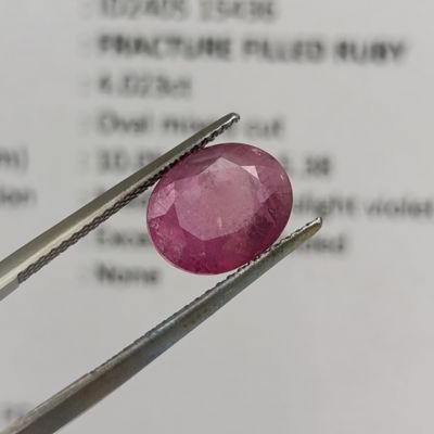 Fracture filled Ruby slight violet red Oval mixed cut 4.02 carat with Gemlab certificate
