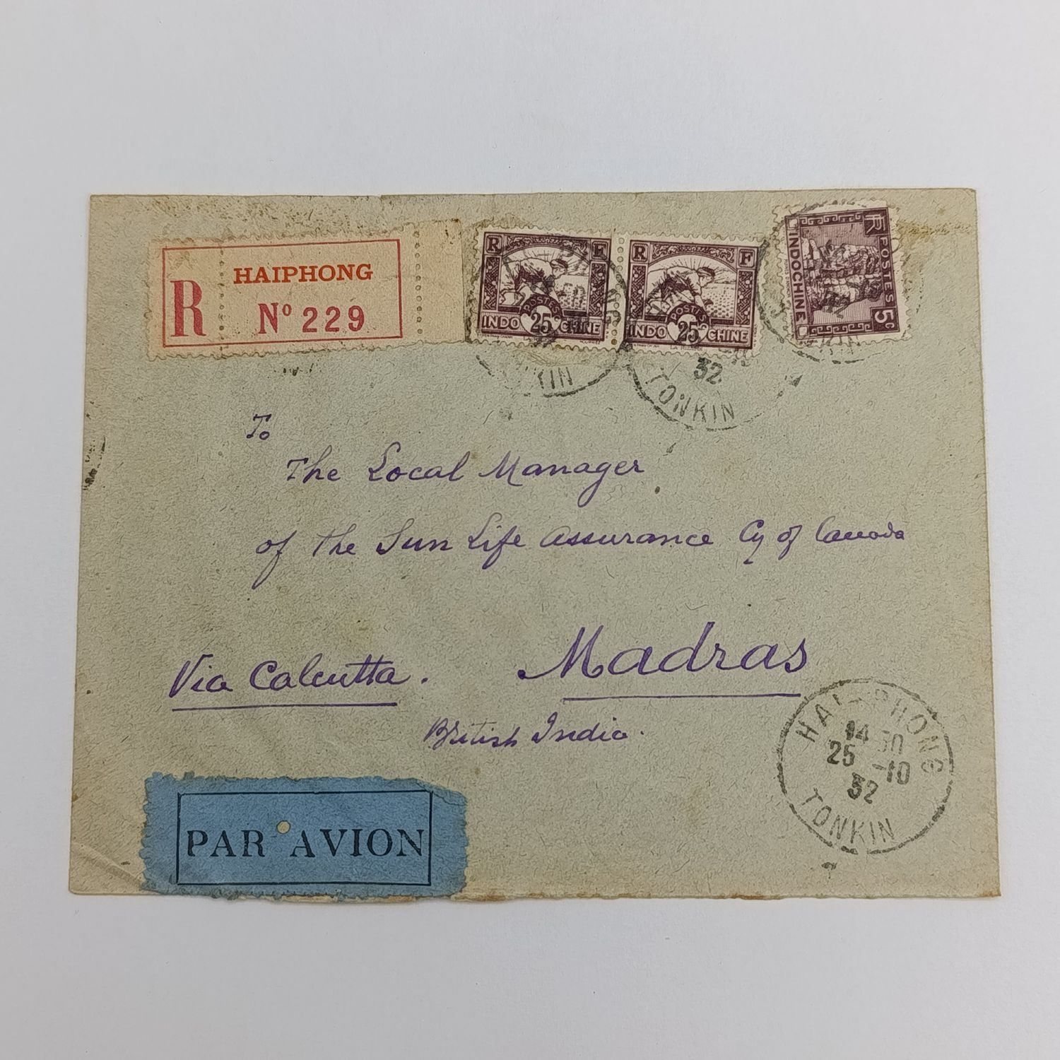 Registered airmail cover with 3 Indo China stamps cancelled HAI-PHONG 25-10-1932 with registration label for Haiphong and paravion blue label posted to Madras British India VIA Calcutta