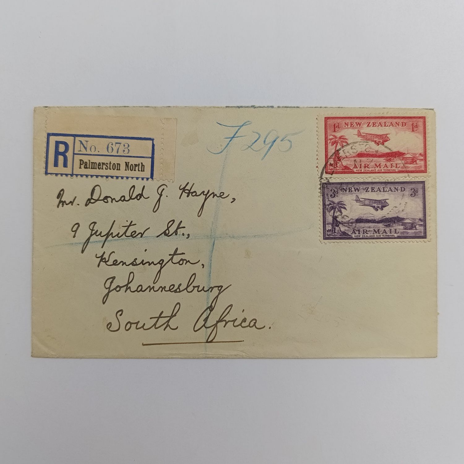 Registered Air Mail cover from Palmerston North New Zealand to Johannesburg South Africa with SG 570-571 stamps - unclear Palmerston cancellation - also New Zealand Centennial Exhibition 1940 label