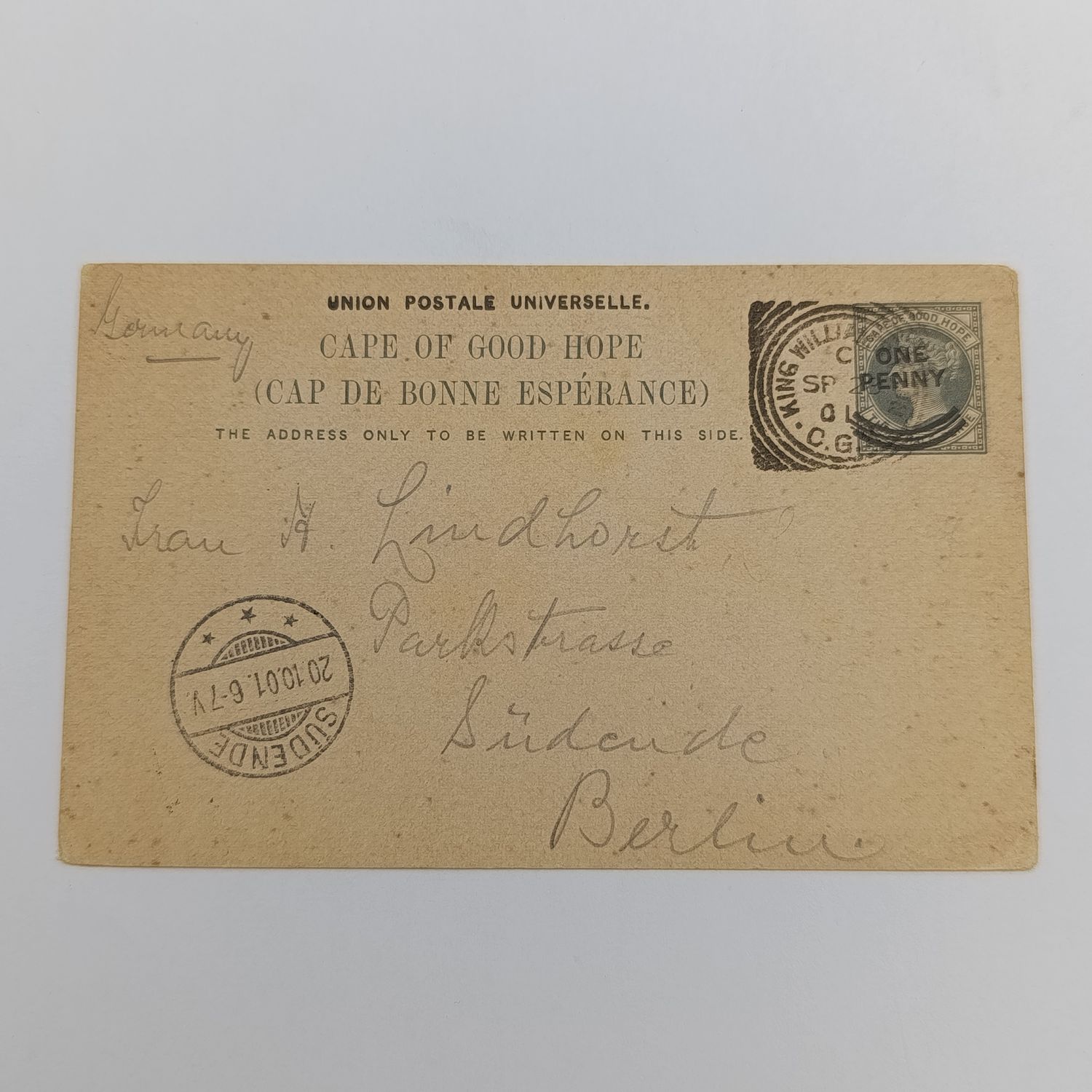 Postcard sent 1901 from King Williams Town, Cape of Good Hope to Berlin, Germany with prepaid three and a half penny printed postage - overstamped One penny - Sudende receiving postmark